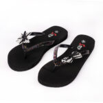 Step BUTTERFLY women's flip-flop slipper in black with polka dot bow - pair front view - Sandal n Shoe - Trade