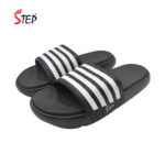 Step KYLO men's slide sandal in black & white - pair front view - Sandal n Shoe - Trade